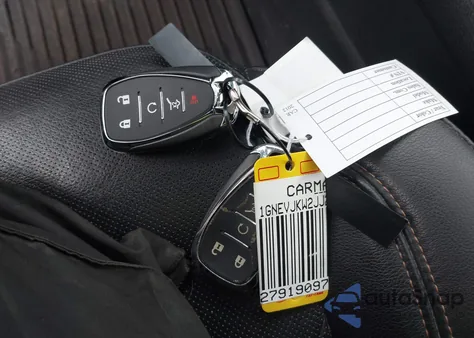 2018 Chevrolet Traverse Premier from USA, damaged, VIN 1GNEVJKW2JJ258912